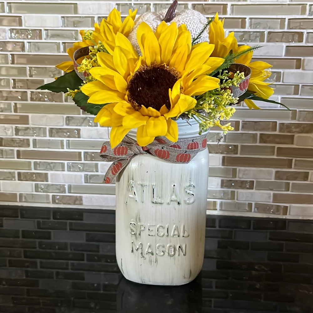 Mason jar sunflower and pumpkin arrangement
